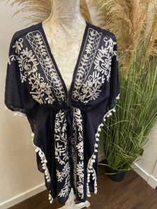 Kaftan With Floral Embroidered Neckline.